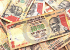 Rupee tumbles to 55.44 against dollar
